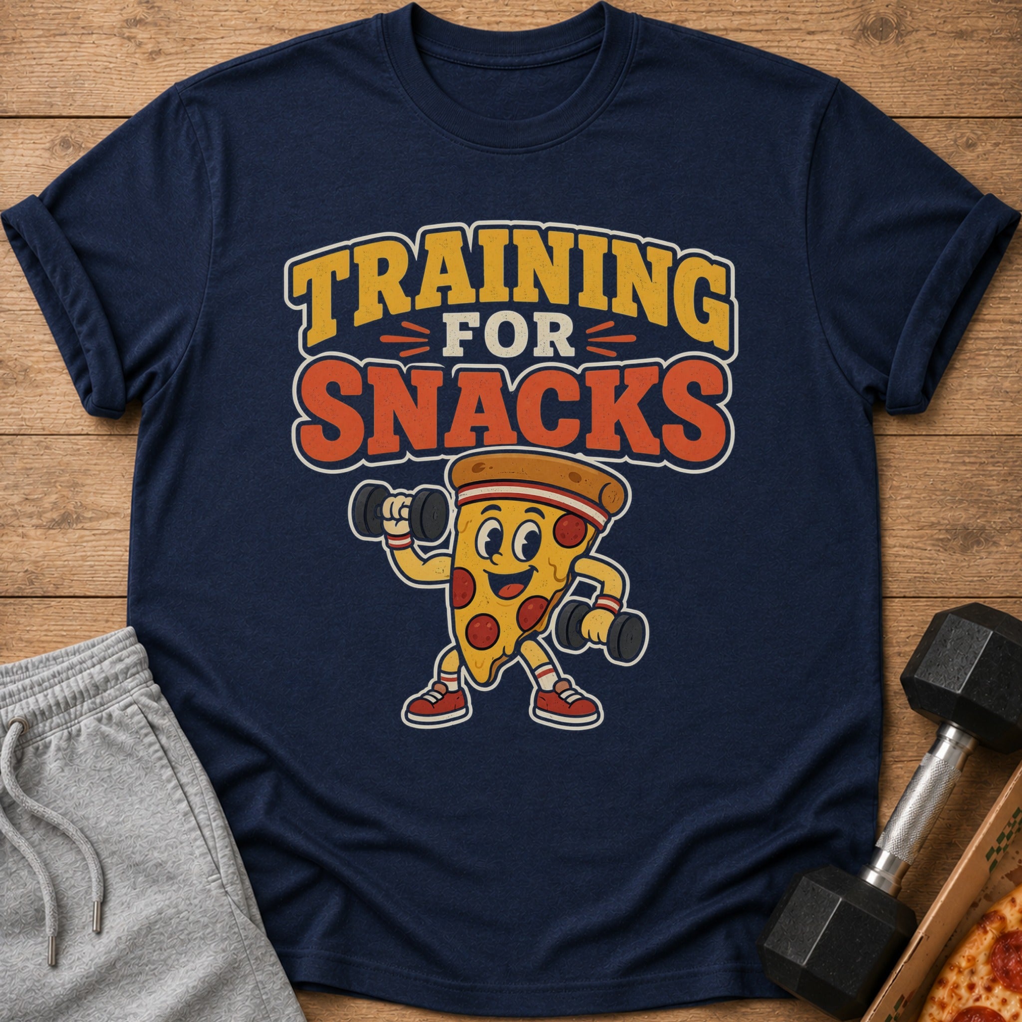 Navy t-shirt with "TRAINING FOR SNACKS" text and a cartoon pizza lifting weights.