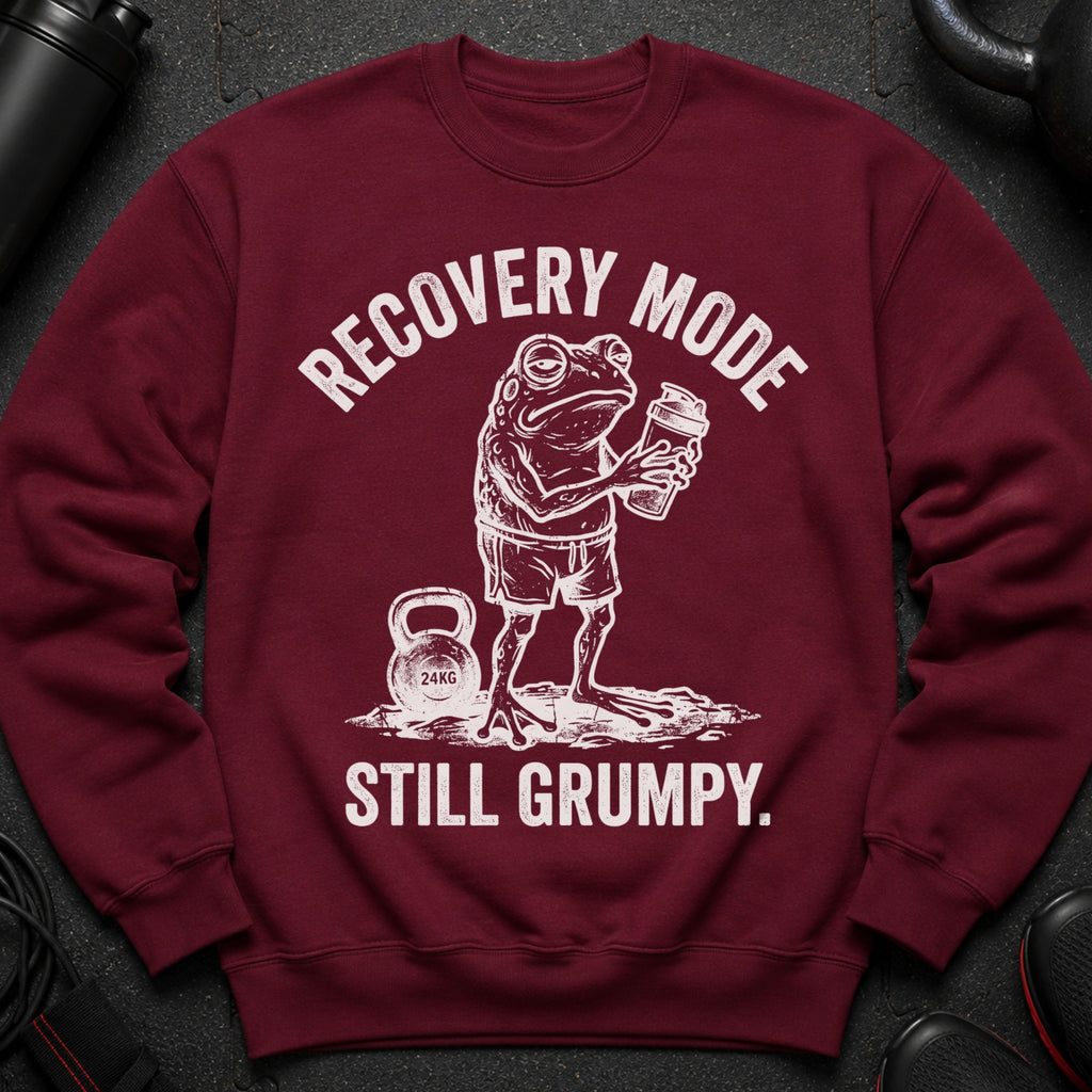 Maroon sweatshirt with a distressed white graphic of a grumpy frog holding a shaker bottle and a 24KG kettlebell.