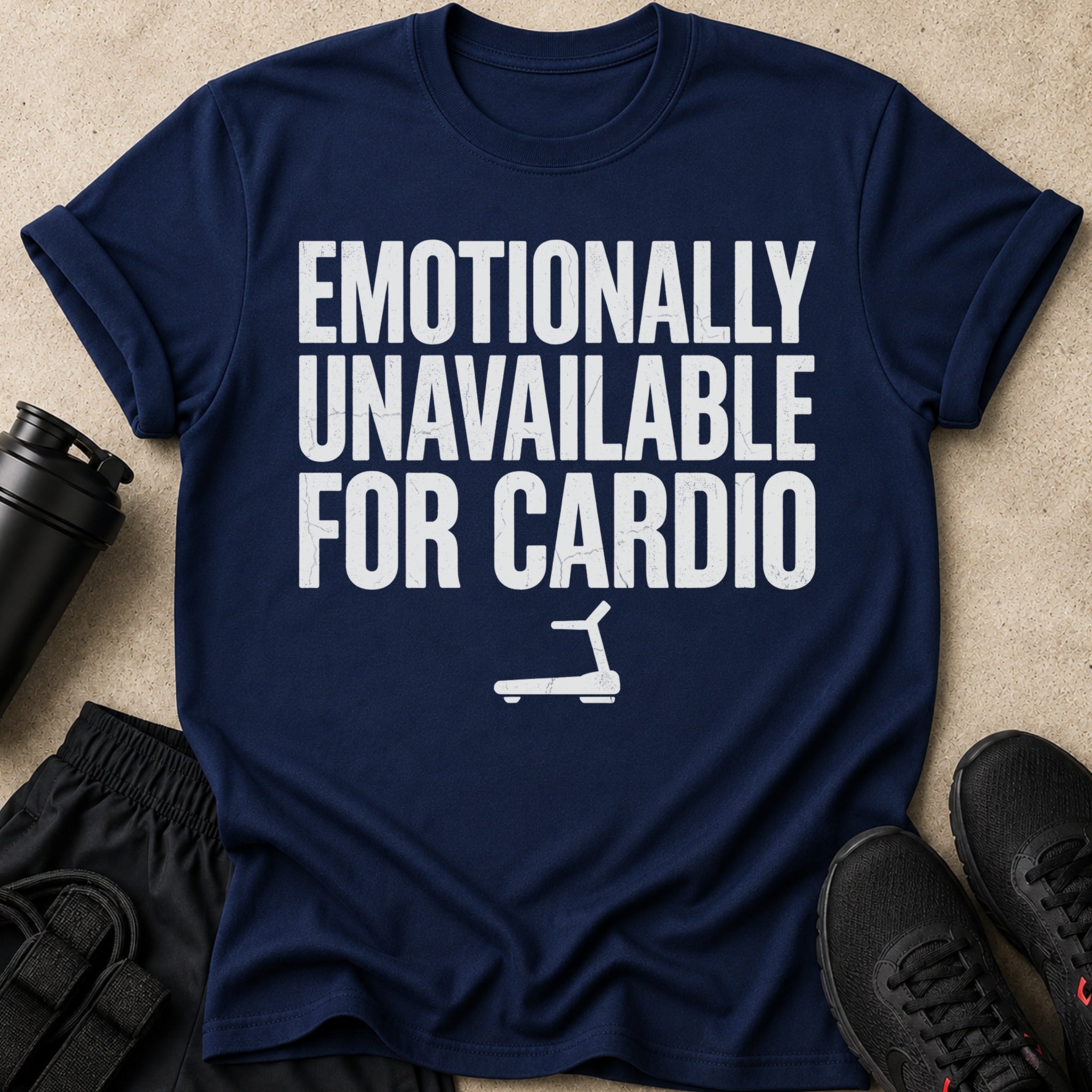Navy t-shirt with white text "Emotionally Unavailable For Cardio" and treadmill graphic.