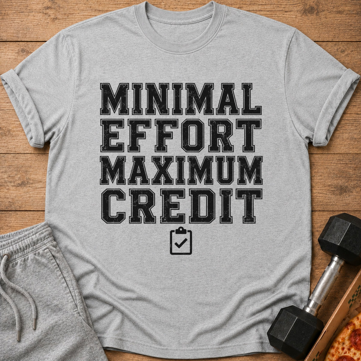 Grey t-shirt with black text "MINIMAL EFFORT MAXIMUM CREDIT" and a checklist icon.
