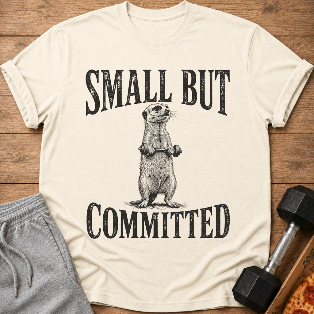 T-shirt with a meerkat lifting weights and the text "SMALL BUT COMMITTED".