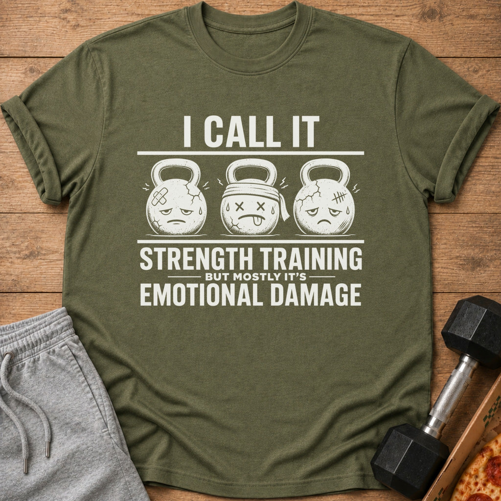 Olive green t-shirt with text "I CALL IT STRENGTH TRAINING BUT MOSTLY IT'S EMOTIONAL DAMAGE".