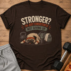 Brown t-shirt with a pug at the gym, reading "Stronger? I'm just consistently not giving up."