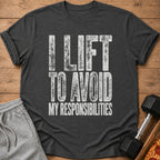 Dark grey t-shirt with white distressed text "I LIFT TO AVOID MY RESPONSIBILITIES".