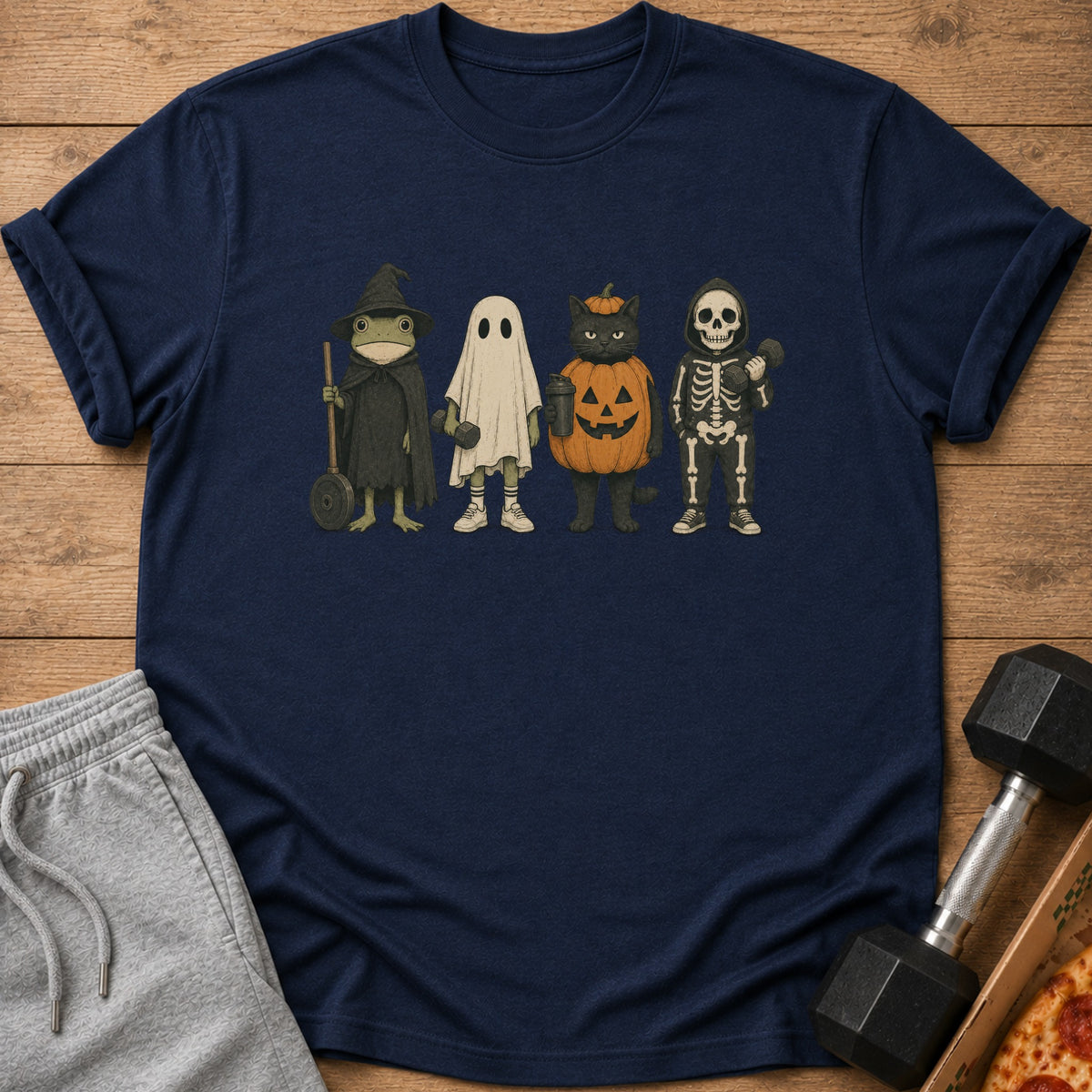 T-shirt with frog, ghost, cat, and skeleton Halloween costumes.