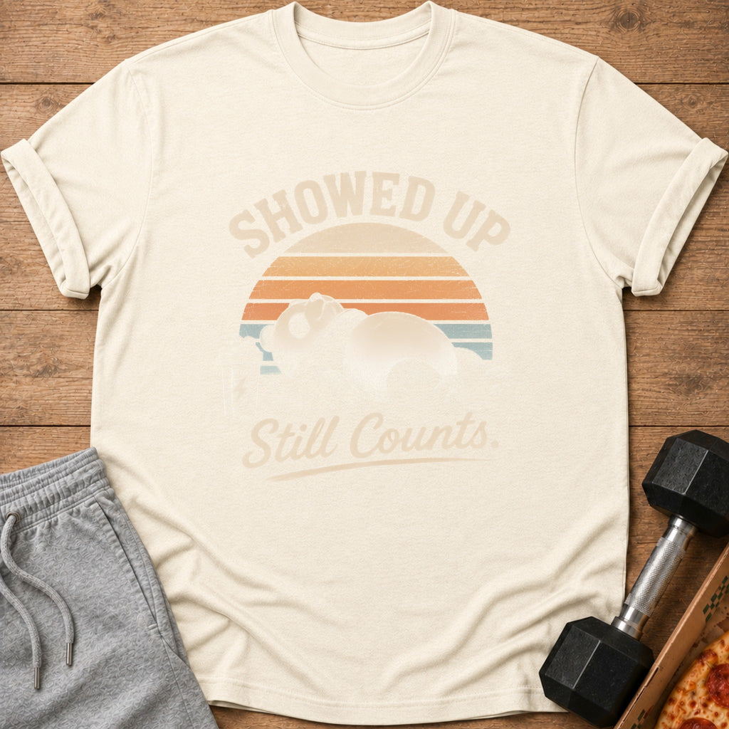 Cream t-shirt with vintage sunset graphic and text "Showed Up Still Counts".