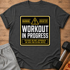 Dark gray t-shirt with "Warning: Low Battery. Workout in Progress." text.