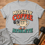 T-shirt with "Mostly Coffee Athlete" text and a tired coffee mug lifting a dumbbell.