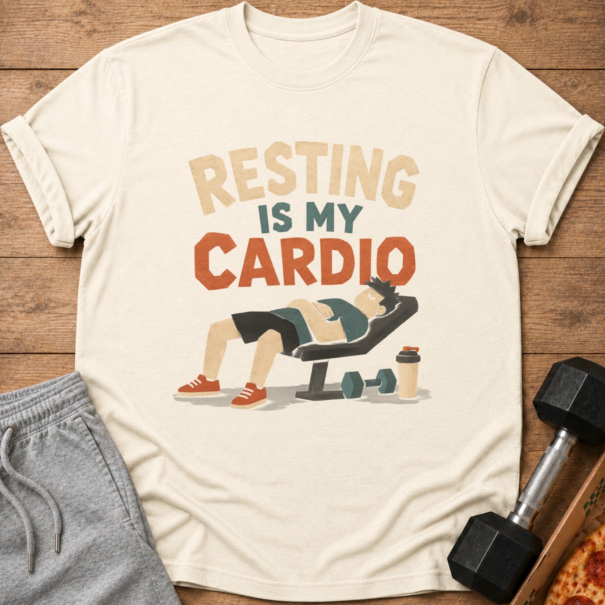 T-shirt with "Resting Is My Cardio" text and illustration of person resting on bench.