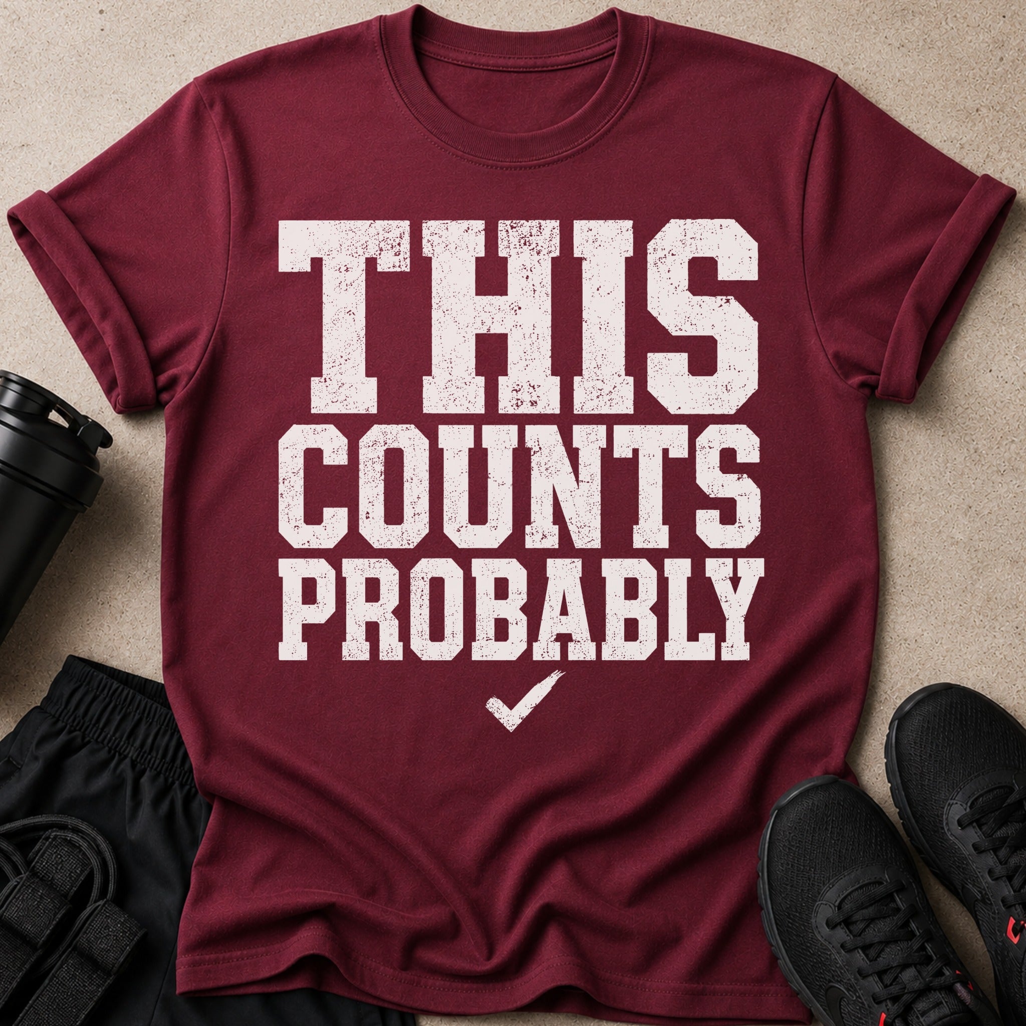 Maroon t-shirt with "THIS COUNTS PROBABLY" text and a checkmark.