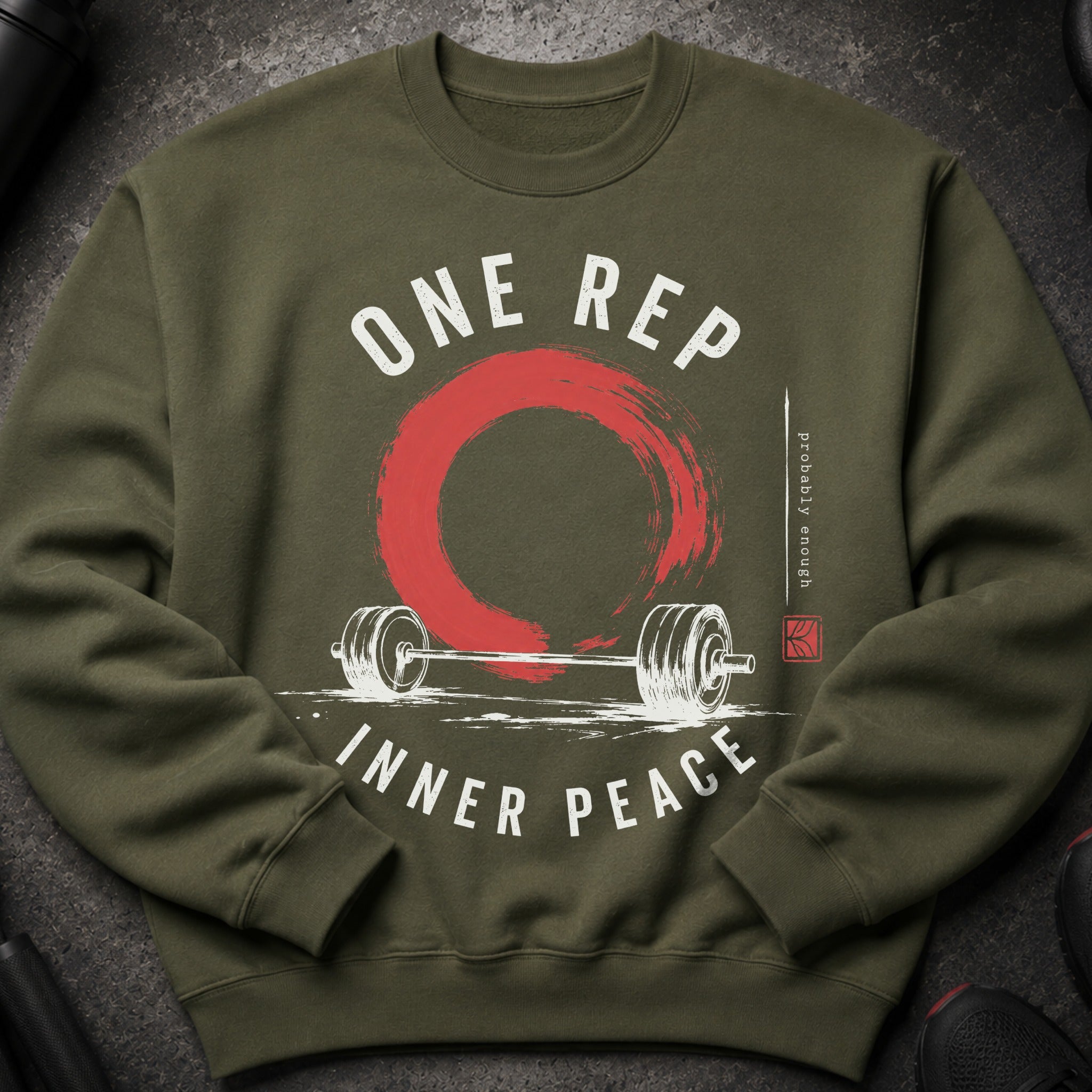 Olive green sweatshirt with white text "ONE REP INNER PEACE" and barbell graphic.