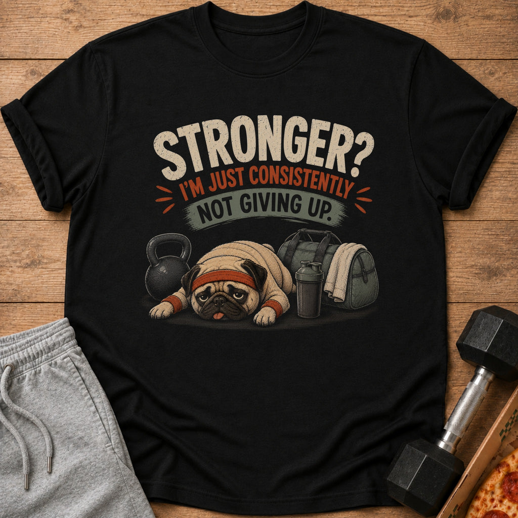 Black t-shirt with pug wearing headband and text: "STRONGER? I'M JUST CONSISTENTLY NOT GIVING UP."