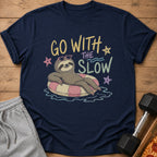 Navy t-shirt with a sloth in a pink and white inner tube and text "GO WITH THE SLOW".