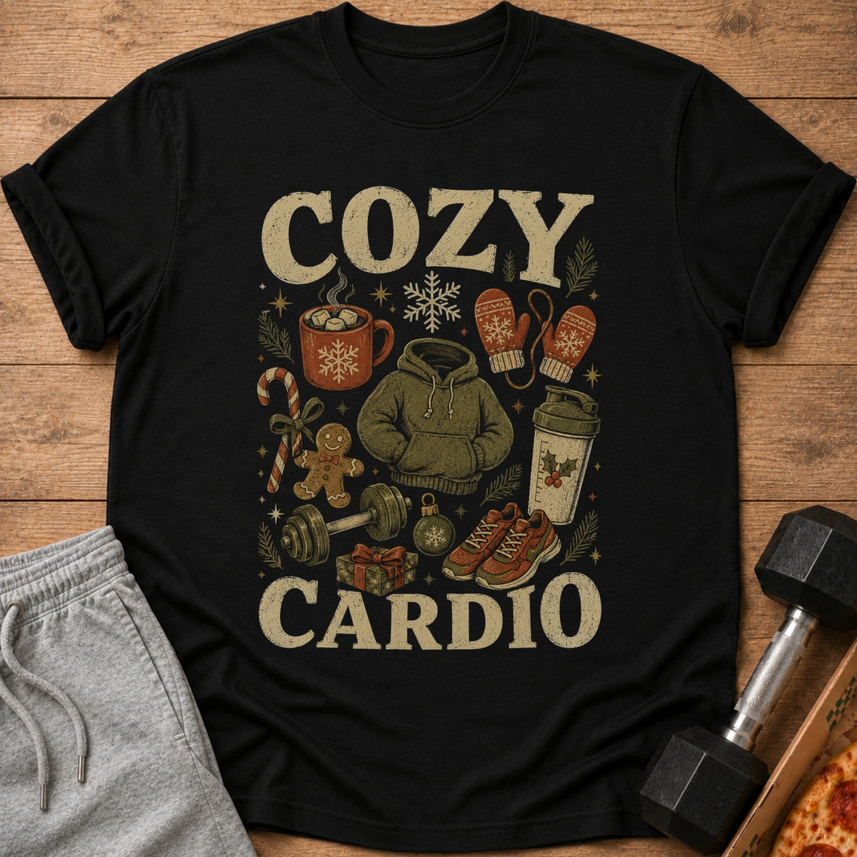 Black t-shirt with "Cozy Cardio" text and festive holiday workout illustrations.