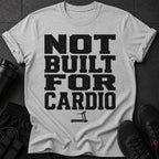 Grey t-shirt with black text "NOT BUILT FOR CARDIO" and a treadmill icon.