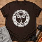 Brown t-shirt with a circular graphic reading "Dumbbells Over Dumb People."