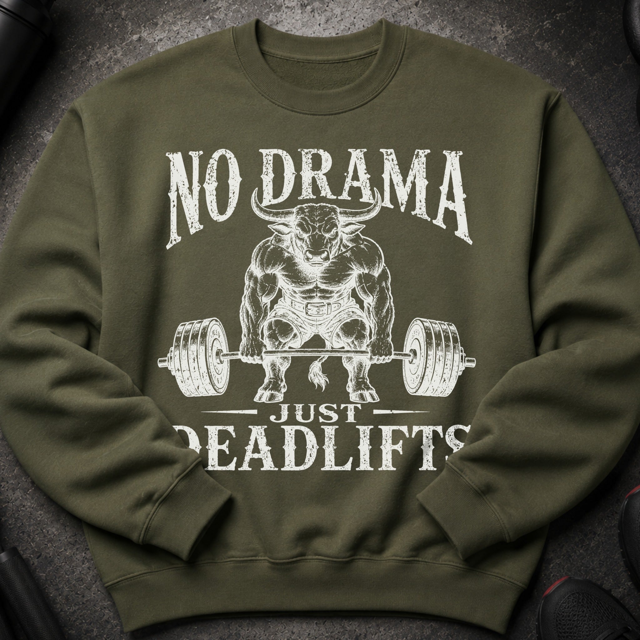 Green sweatshirt with white text and illustration of a bull deadlifting.