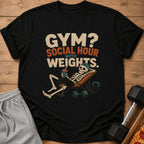Black t-shirt with text "GYM? SOCIAL HOUR WITH WEIGHTS." and skeleton on weight bench.