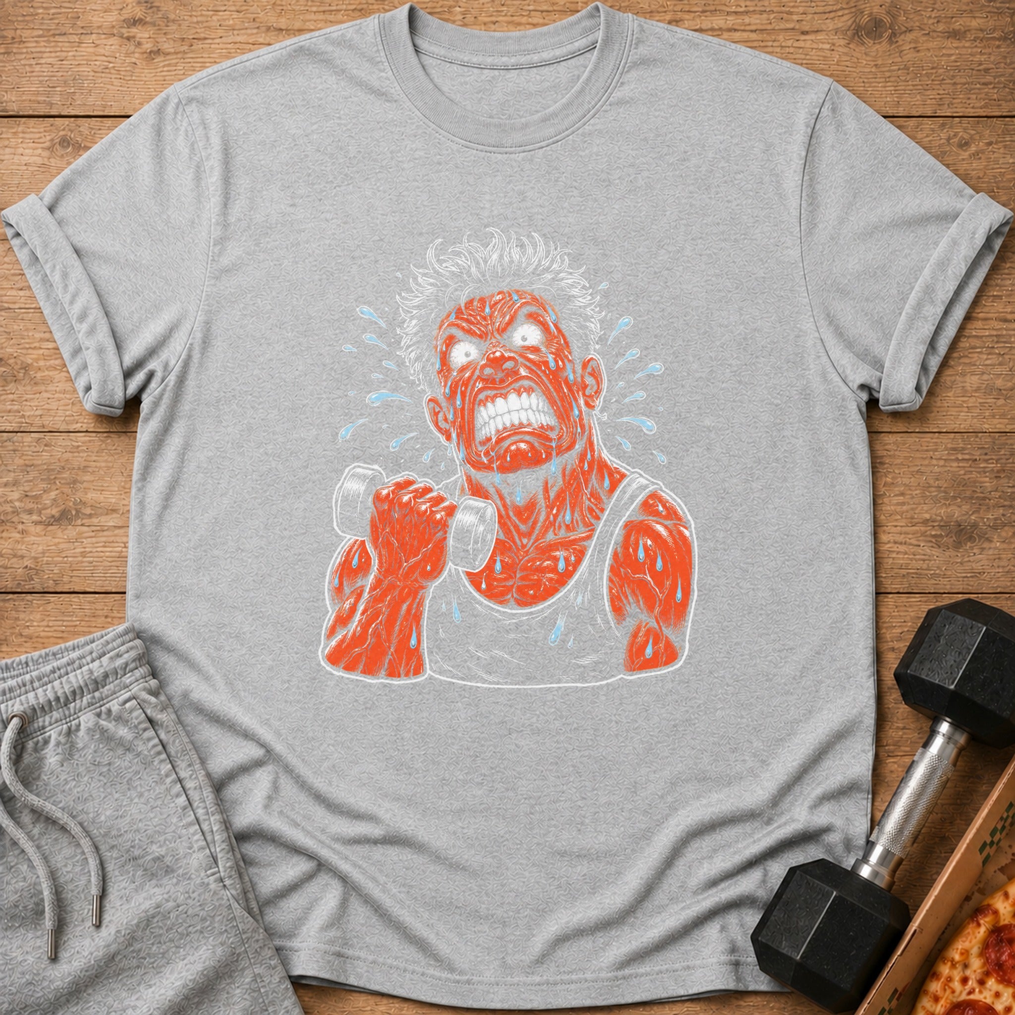 Grey t-shirt with distressed orange depiction of a sweating man lifting a dumbbell.