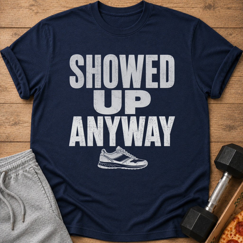 Navy t-shirt with white distressed text "SHOWED UP ANYWAY" and a running shoe.