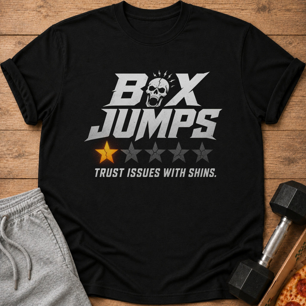 Black t-shirt with "Box Jumps" text, skull graphic, one yellow star, and "Trust Issues With Shins."