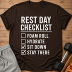 Brown t-shirt with "REST DAY CHECKLIST" and a humorous checklist.
