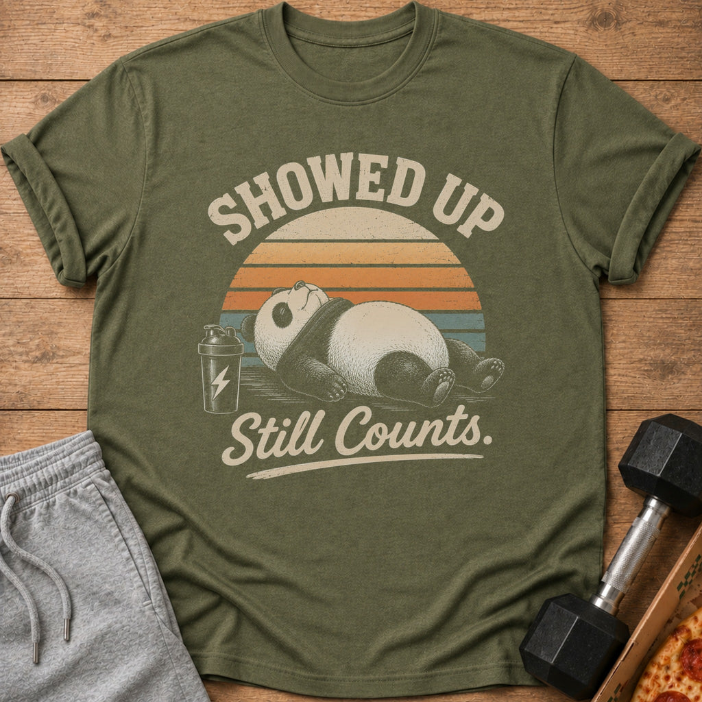 Olive t-shirt with panda lying down and text "Showed Up. Still Counts."