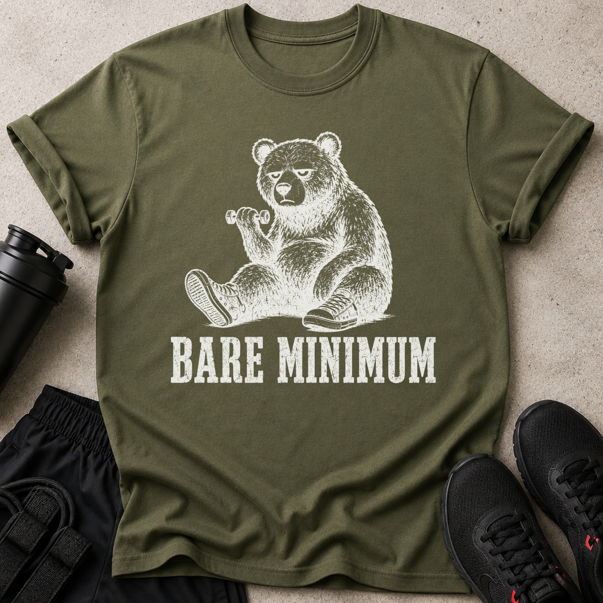Olive t-shirt with a white graphic of a bear lifting a dumbbell with text "BARE MINIMUM".