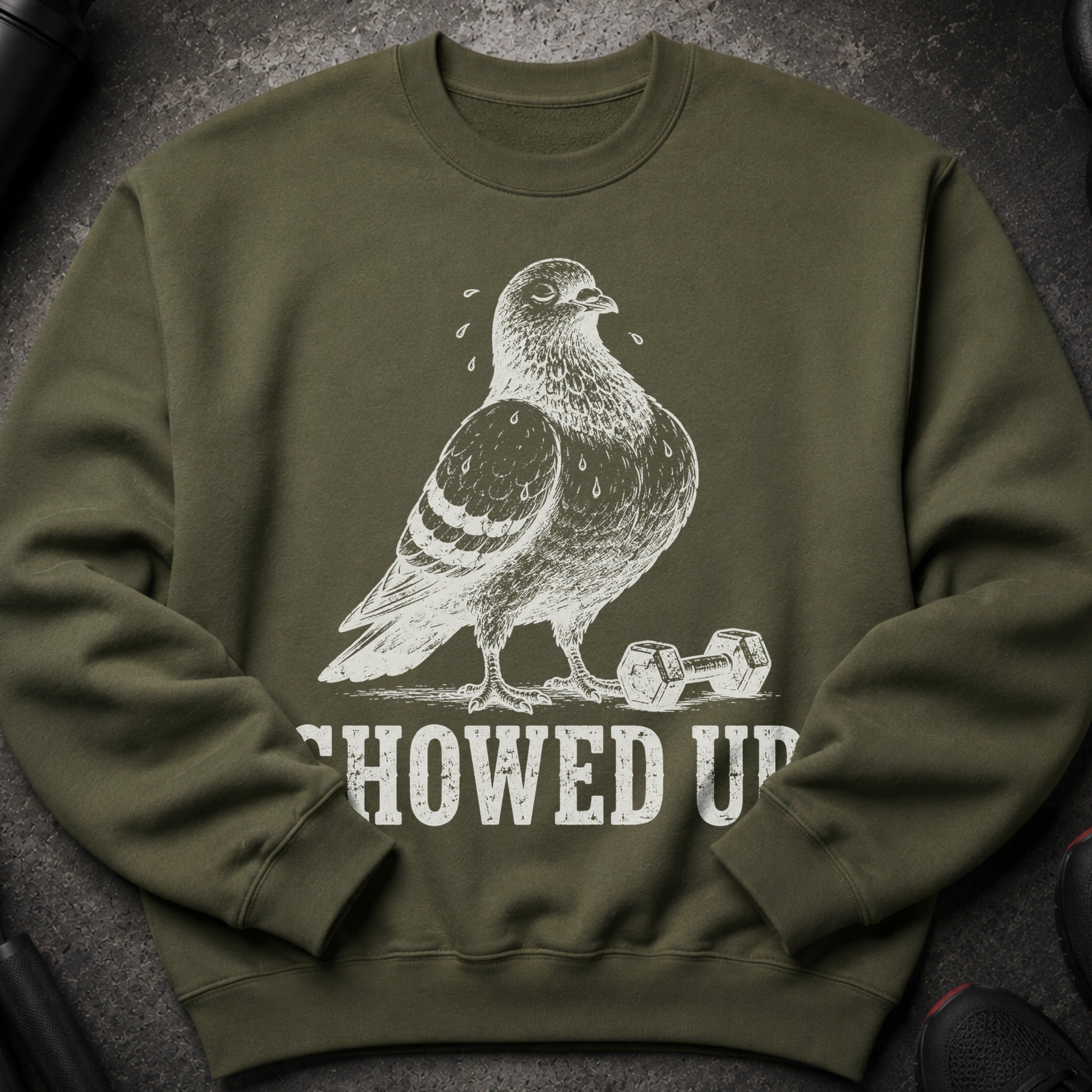 Green sweatshirt with a distressed white graphic of a sweating pigeon and a dumbbell, text reads "CHOWED UP".