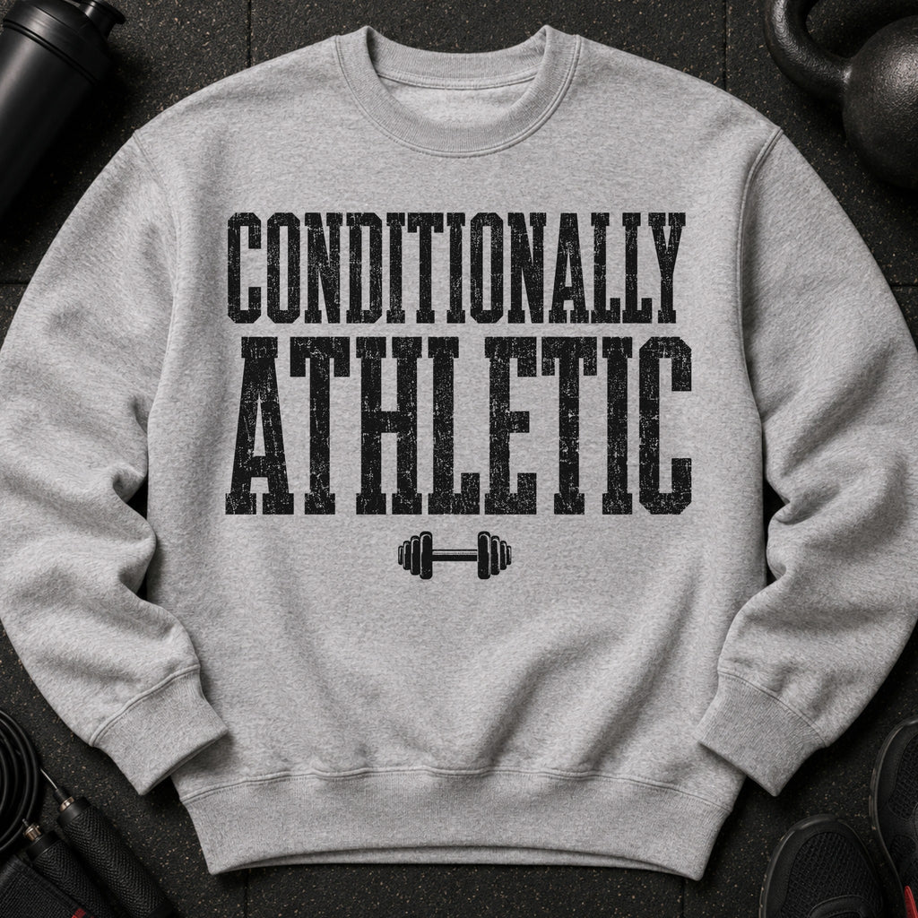 Grey crewneck sweatshirt with text "CONDITIONALLY ATHLETIC" and dumbbell graphic.