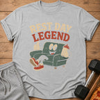 Grey t-shirt with cartoon couch holding a shaker bottle and text "Rest Day Legend".