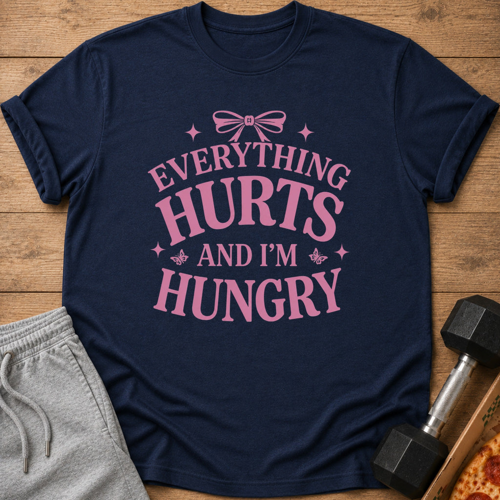 Navy t-shirt with pink text "EVERYTHING HURTS AND I'M HUNGRY"