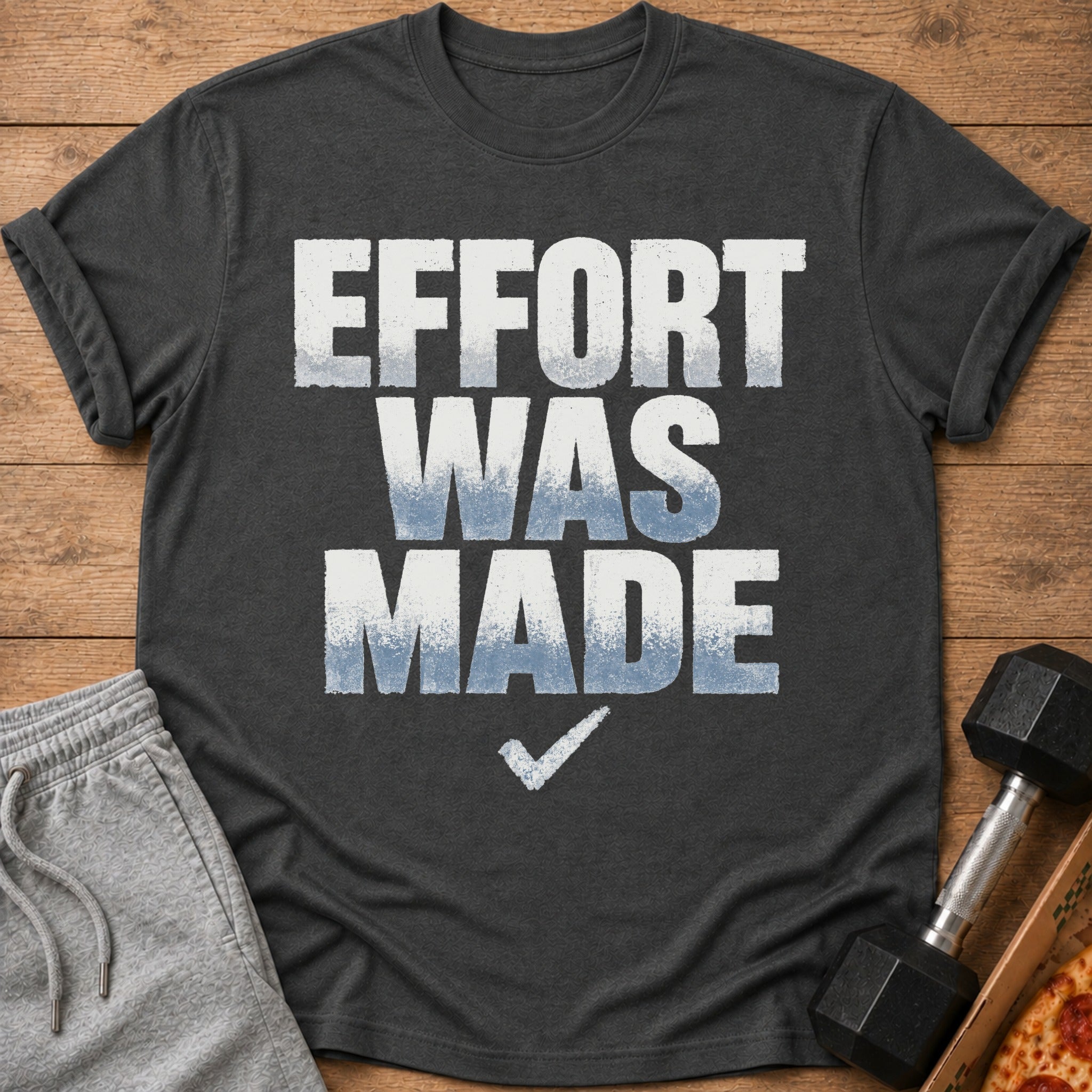 Dark grey t-shirt with "EFFORT WAS MADE" text and a checkmark.