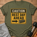 Green t-shirt with "CAUTION REST DAY AHEAD" text and a foam roller graphic.