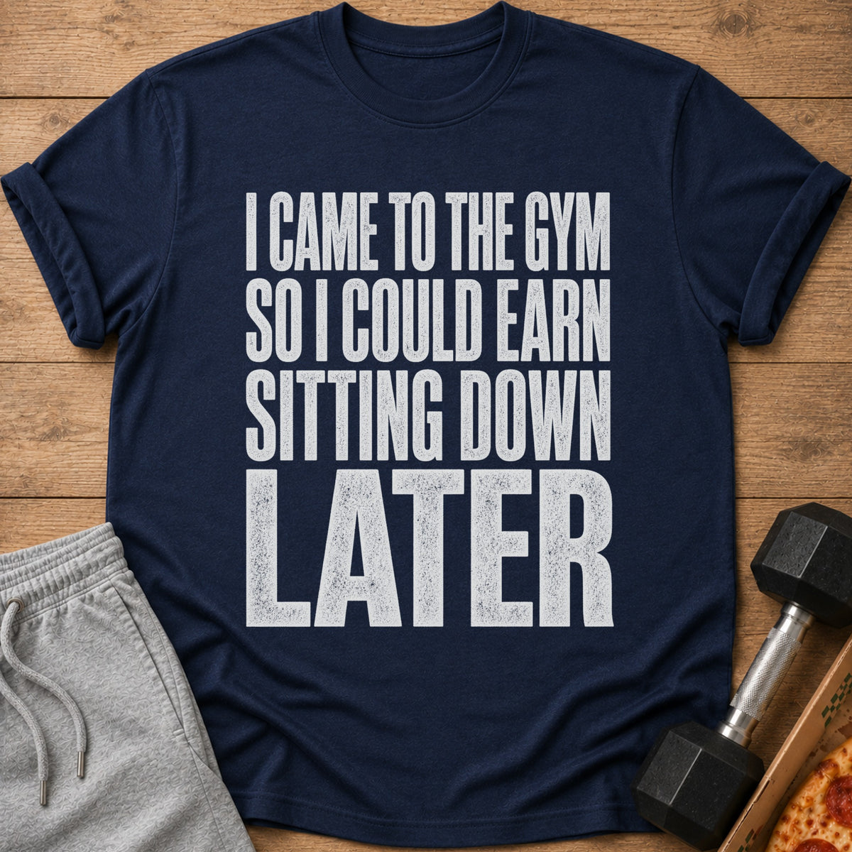 Navy t-shirt with white text: "I Came To The Gym So I Could Earn Sitting Down Later."