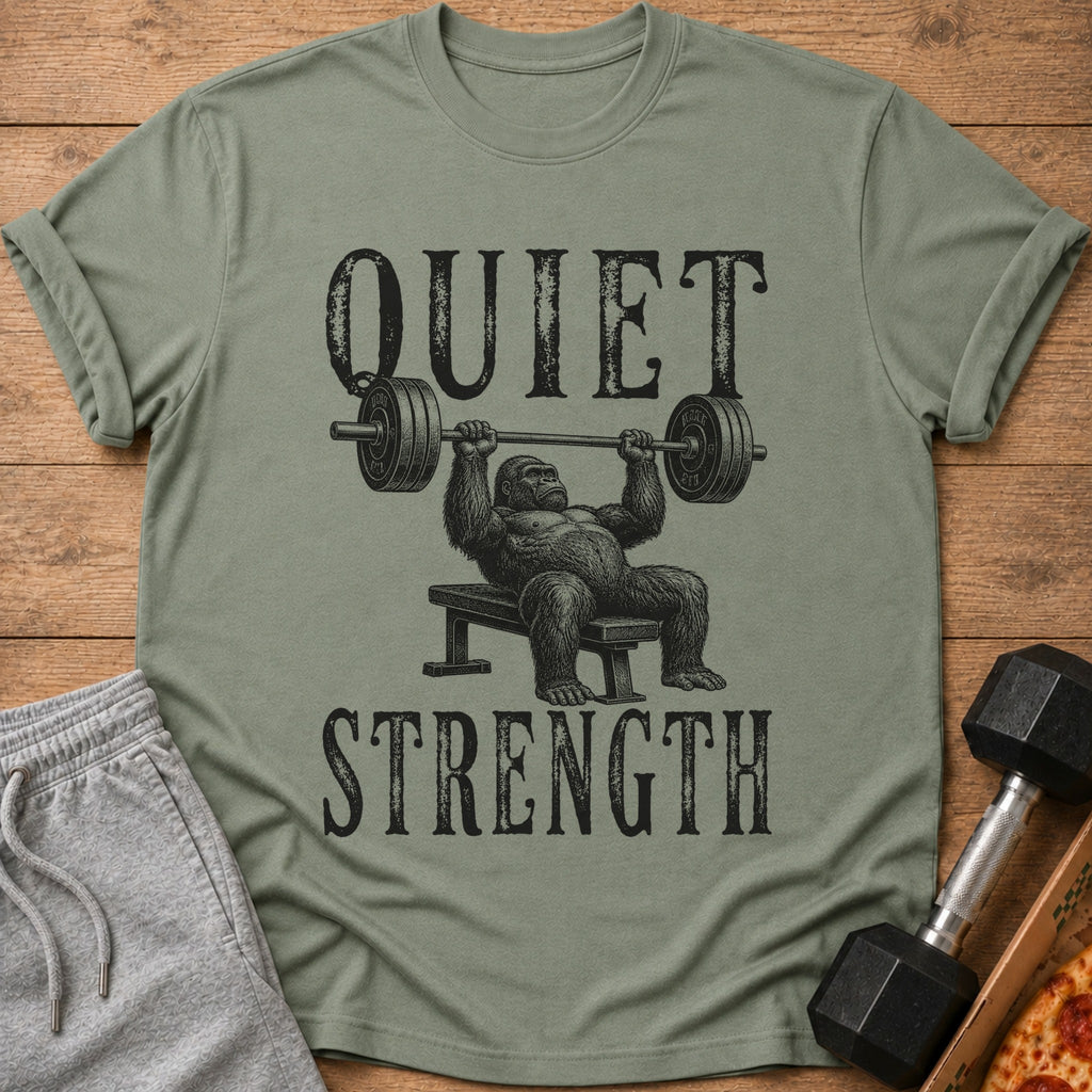 T-shirt with gorilla bench pressing and text "QUIET STRENGTH".