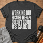 Dark grey t-shirt with white text "WORKING OUT BECAUSE THERAPY DOESN'T COUNT AS CARDIO".