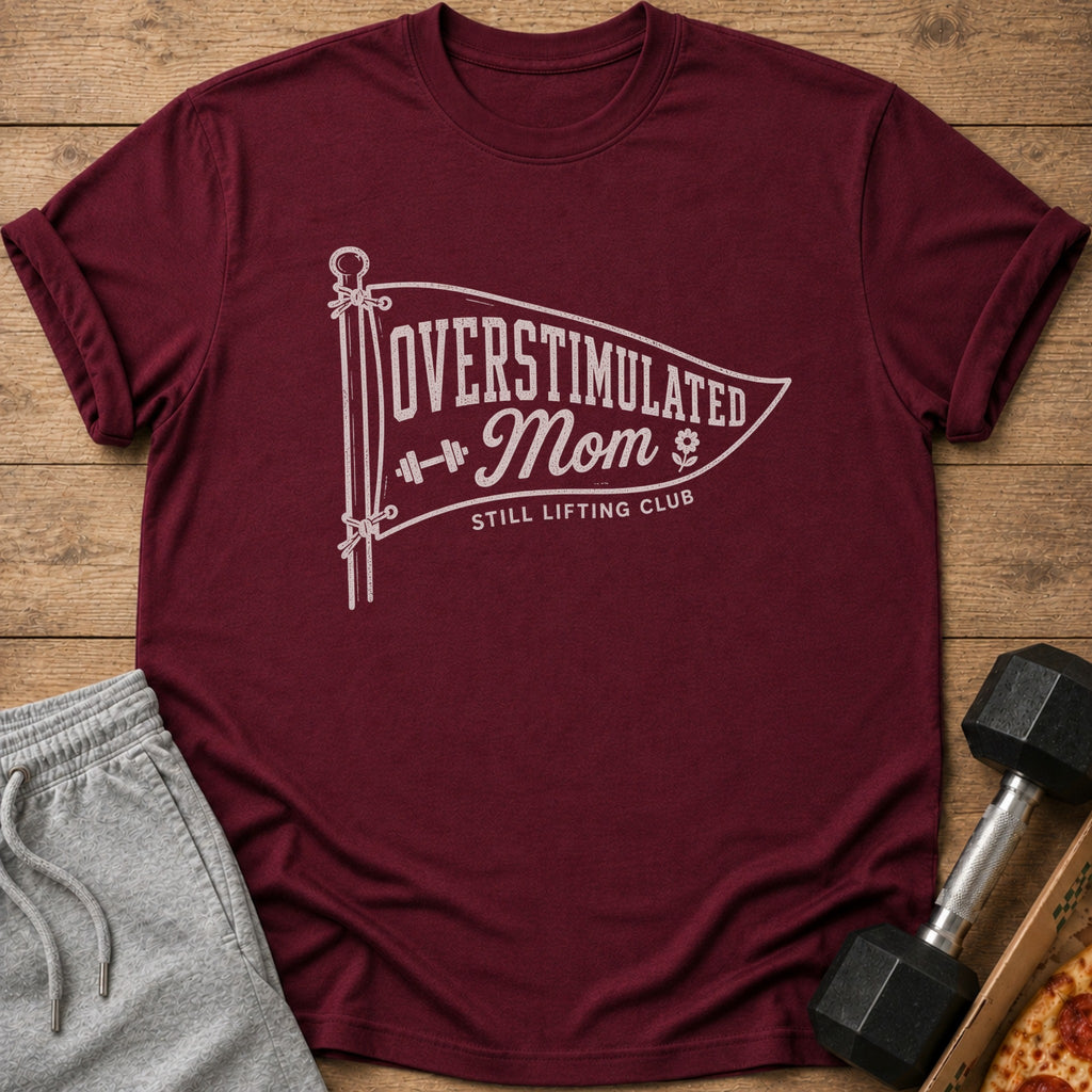 Maroon t-shirt with "Overstimulated Mom Still Lifting Club" text and graphics.