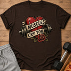 Brown t-shirt with distressed heart, barbell, rose, and text "Muscles Cry Too".