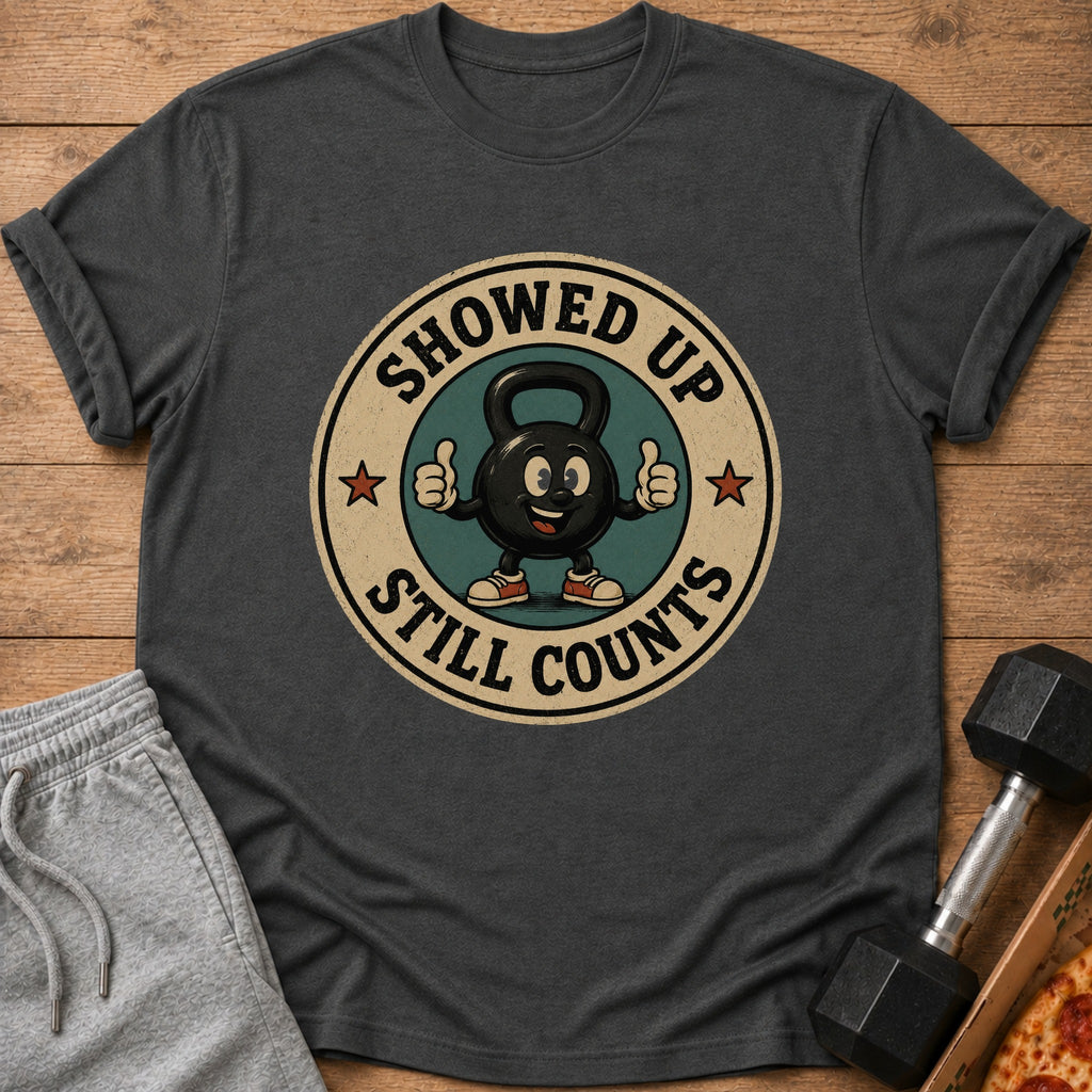 Kettlebell graphic on t-shirt reads "Showed Up Still Counts".