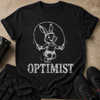 Black t-shirt with a cartoon bunny jumping rope and the word OPTIMIST.