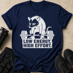 Navy t-shirt with white raccoon lifting weights and text "LOW ENERGY. HIGH EFFORT."