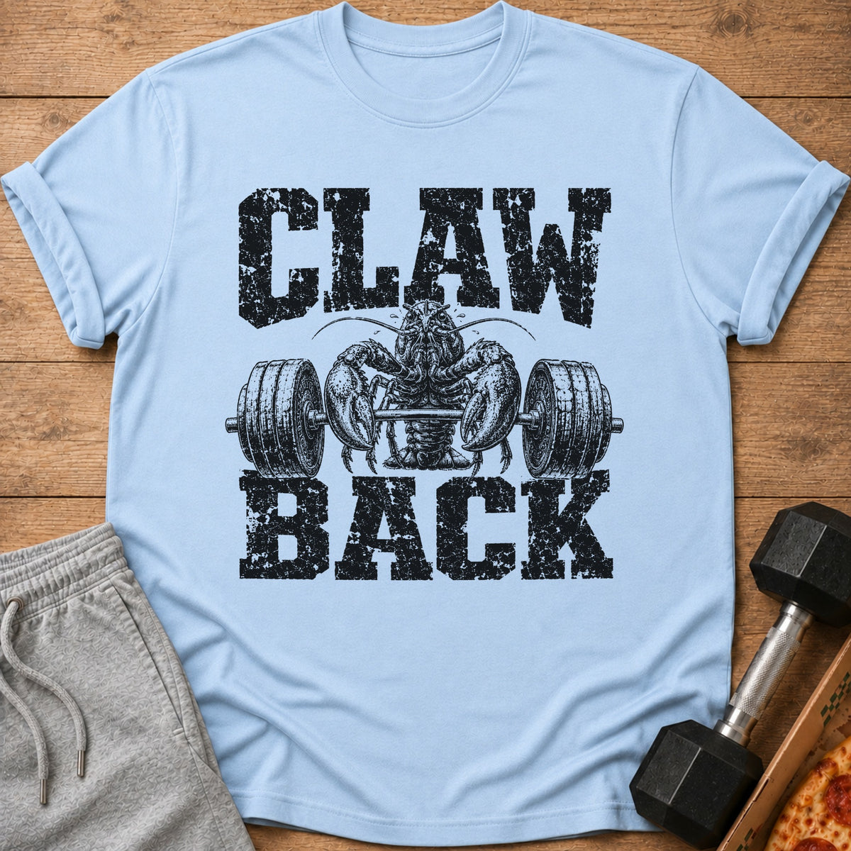 Light blue t-shirt with black graphic of lobster lifting barbell and text "CLAW BACK".