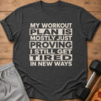 Dark grey t-shirt with "My workout plan is mostly just proving I still get tired in new ways." text.