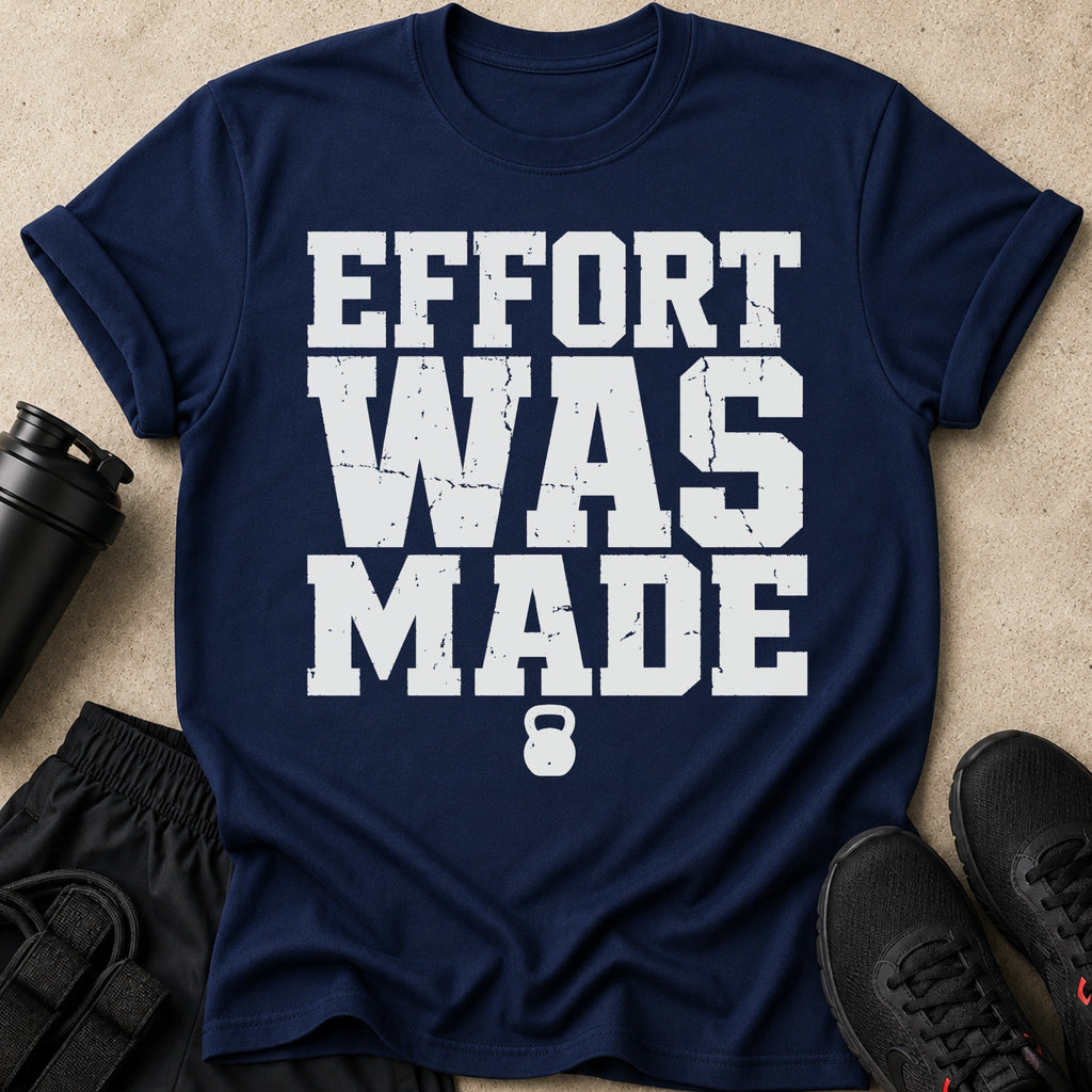 Navy t-shirt with white text "EFFORT WAS MADE" and a kettlebell graphic.