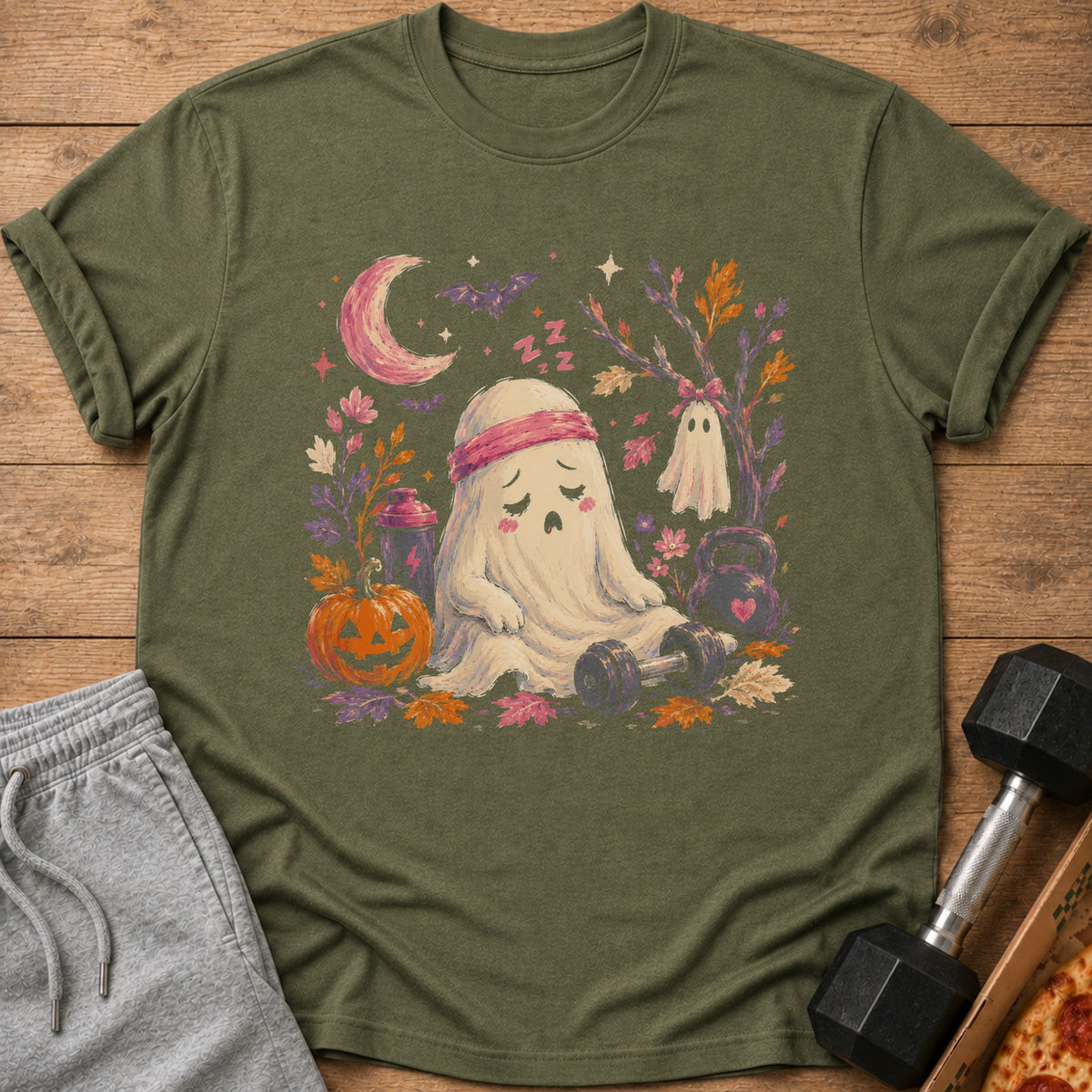 Tired ghost with headband sits near gym equipment and Halloween decorations.