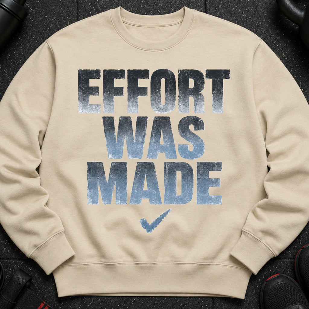Tan crewneck sweatshirt with distressed "EFFORT WAS MADE" text and a checkmark graphic.