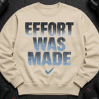 Tan crewneck sweatshirt with distressed "EFFORT WAS MADE" text and a checkmark graphic.