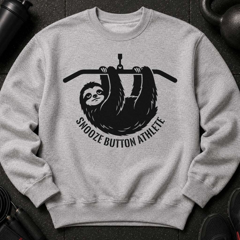 Gray sweatshirt with black sloth graphic and "Snooze Button Athlete" text.