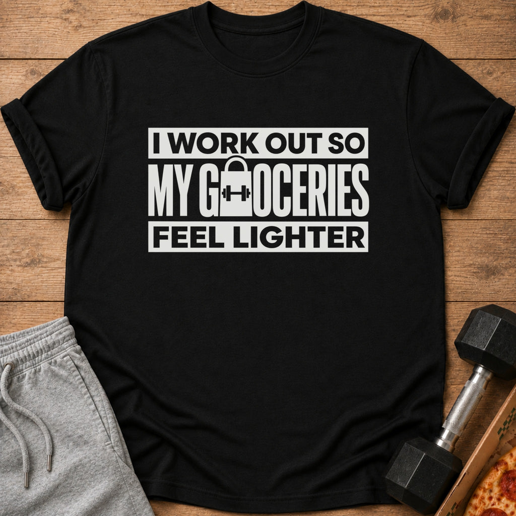 Black t-shirt with white text "I work out so my groceries feel lighter."